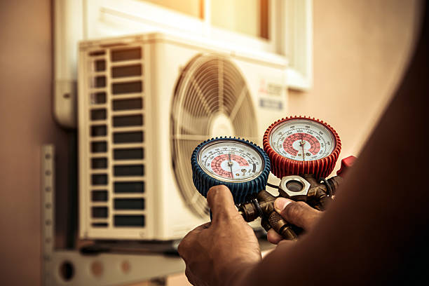 Professional Air Conditioning Service technician working in River Grove, IL